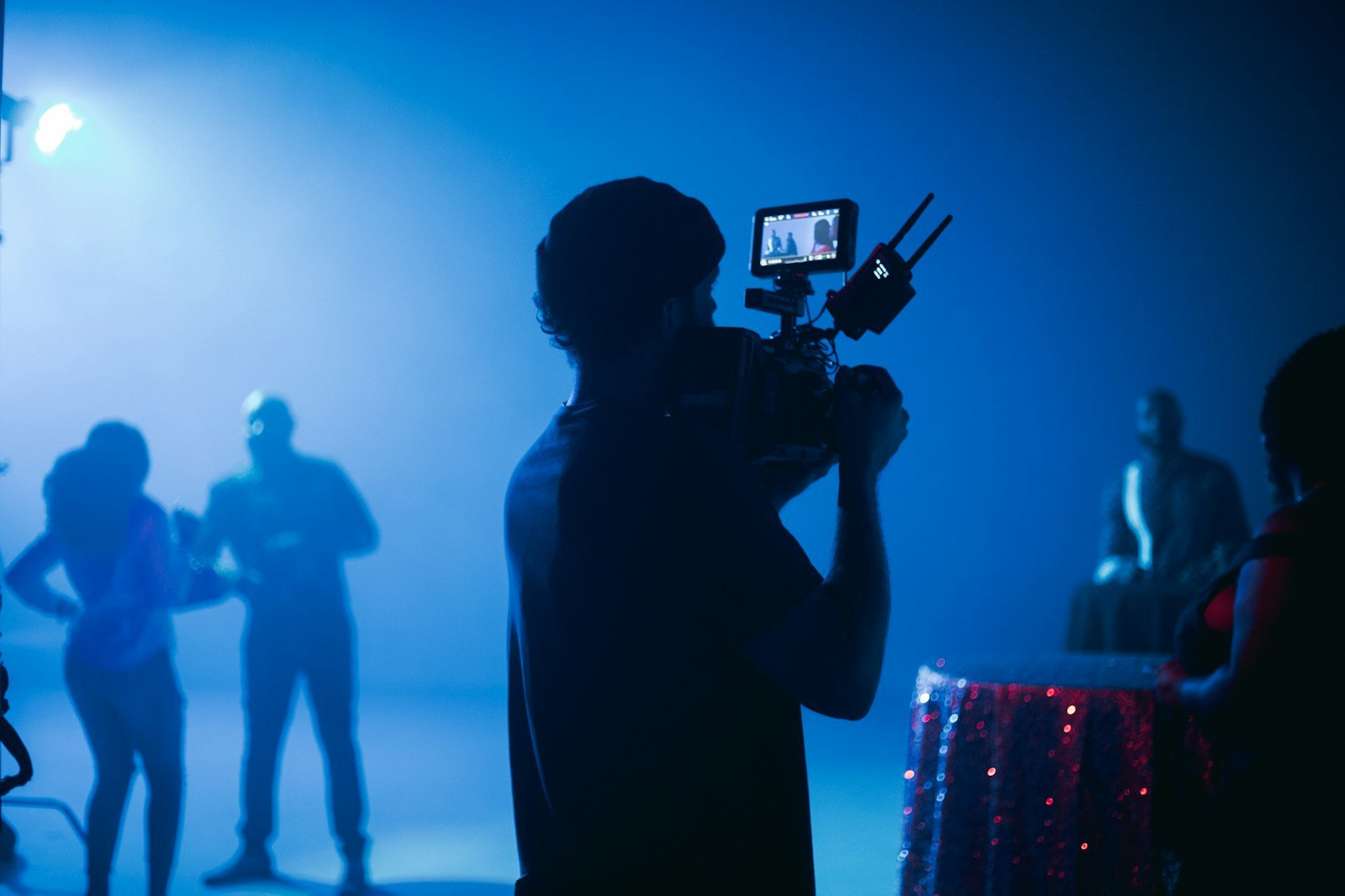 Content creator holding a camera at sunset – influencer marketing agency in Delhi