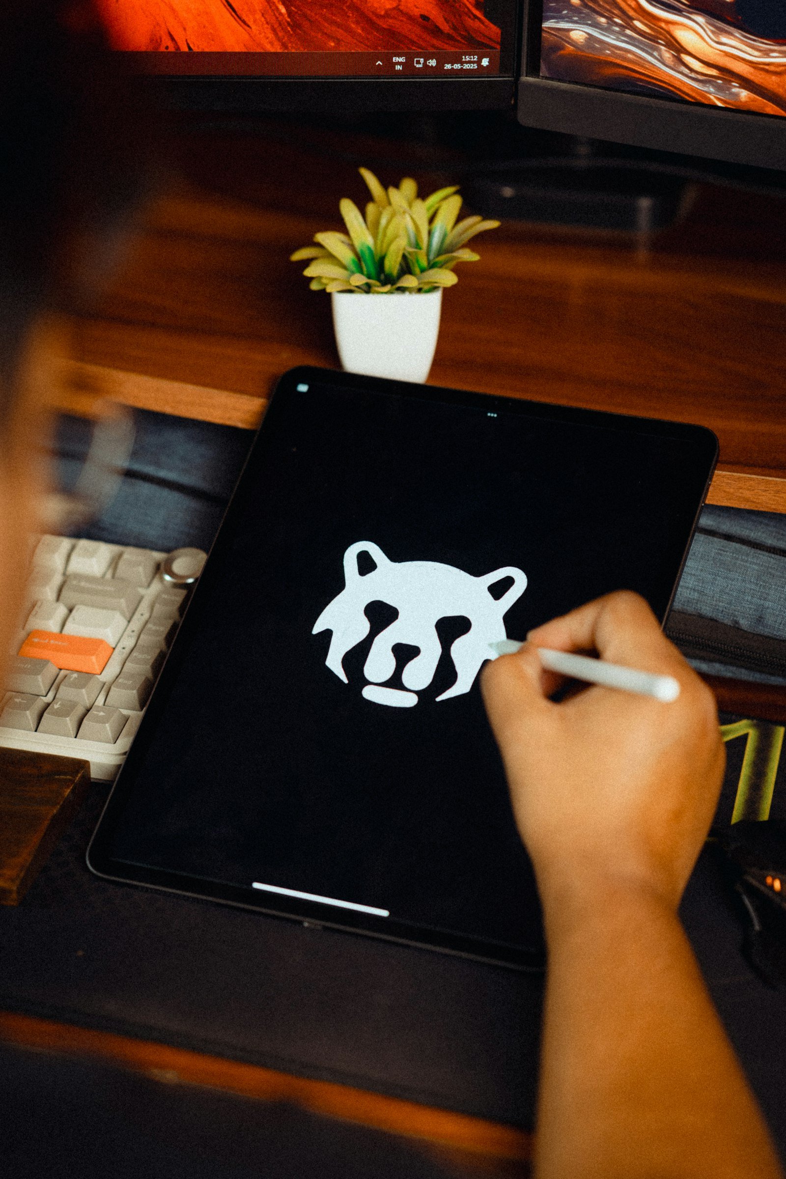 Logo design being drawn on a tablet – logo & brand identity design in Delhi