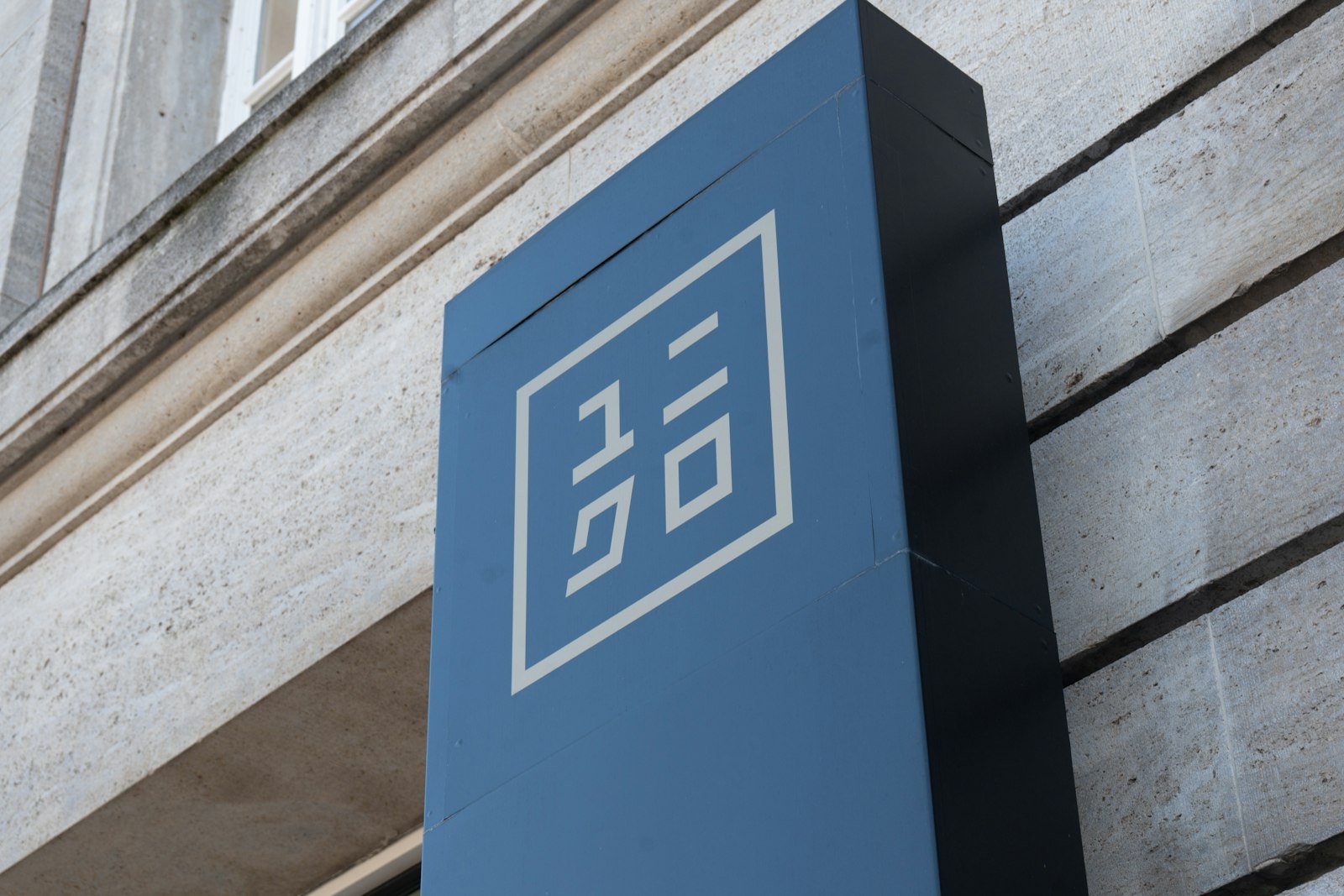 Logo signage on a building – logo & brand identity design in Delhi